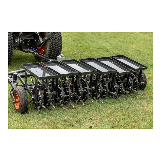 Bobcat AE72 72-inch tow-behind aerator with dual-axle design, commercial-grade tines, and high-productivity coverage