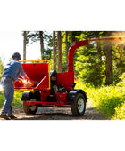Barreto 3107C wood chipper with 31 HP engine, 7-inch chipping capacity, and heavy-duty hydraulic feed