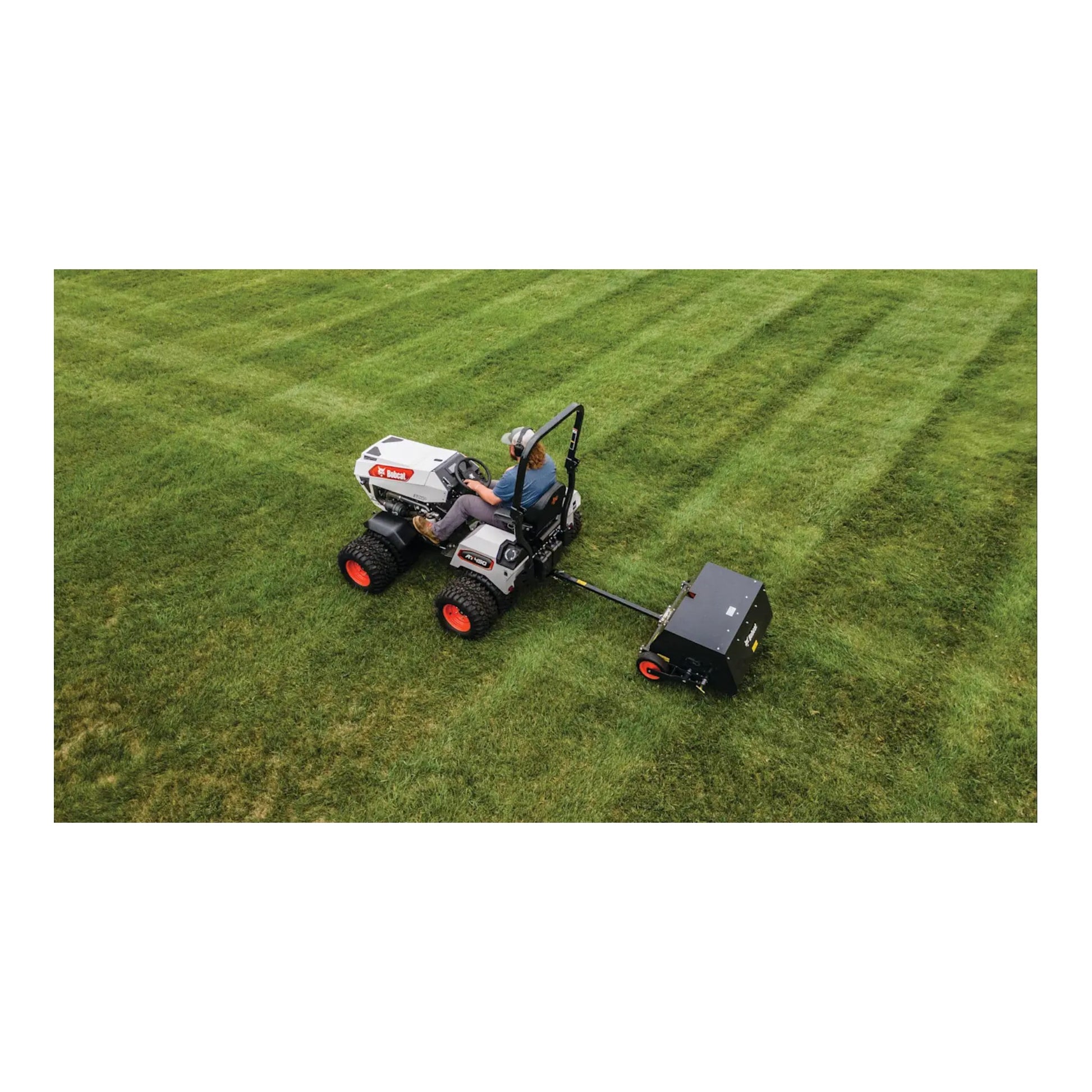 Bobcat AE36 36-inch tow-behind aerator with 4-wheel design, heavy-duty tines, and commercial durability