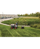 Bobcat AE36 36-inch tow-behind aerator with 4-wheel design, heavy-duty tines, and commercial durability