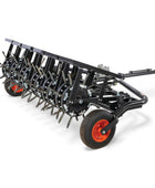 Bobcat AE72 72-inch tow-behind aerator with dual-axle design, commercial-grade tines, and high-productivity coverage