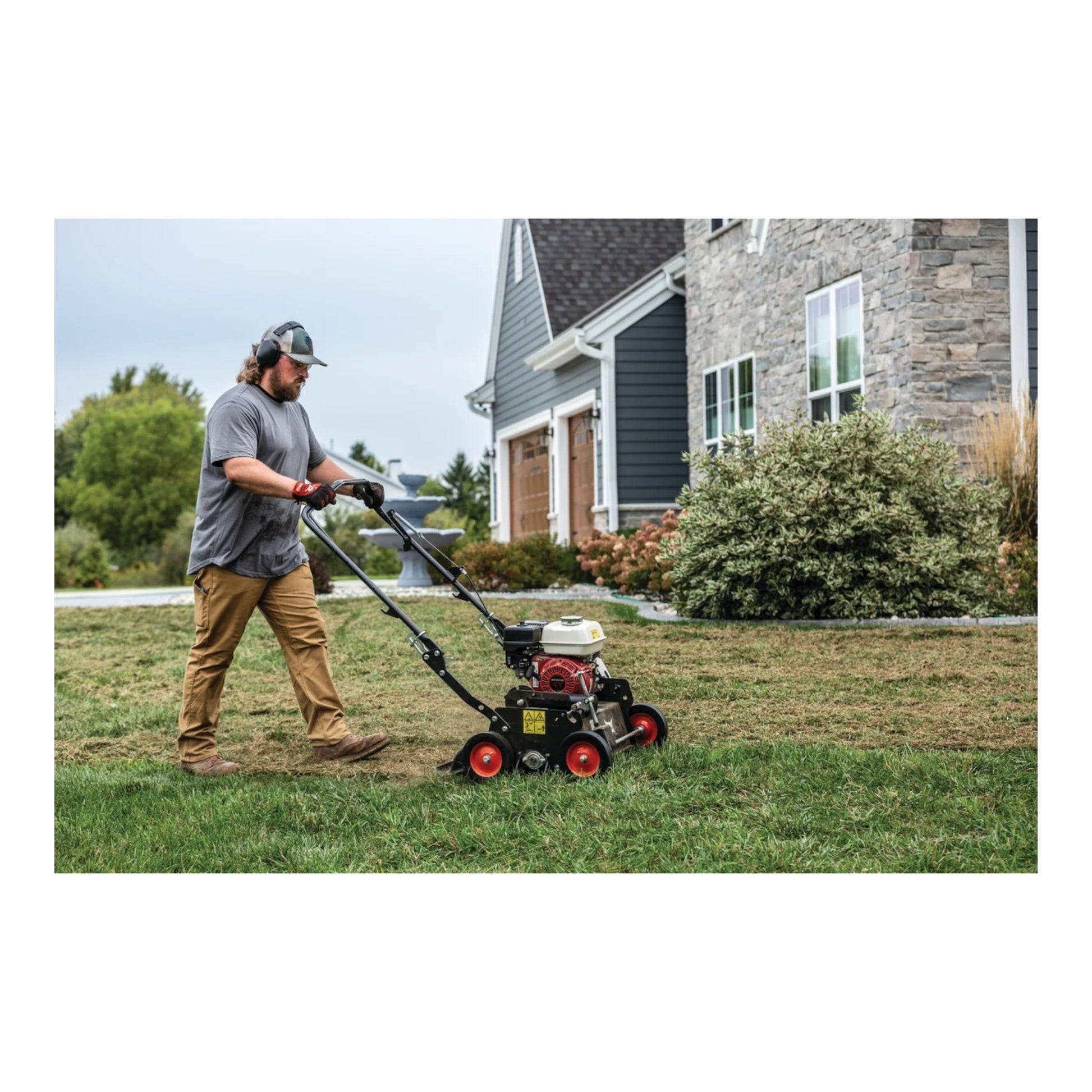 Bobcat DT18 18-inch push dethatcher with rugged tines and manual pull-behind design