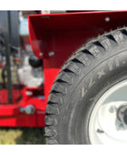 Buffalo Turbine Blitz Stand-On Debris Blower with elevated operator platform, high-velocity turbine, and 360-degree directional airflow nozzle