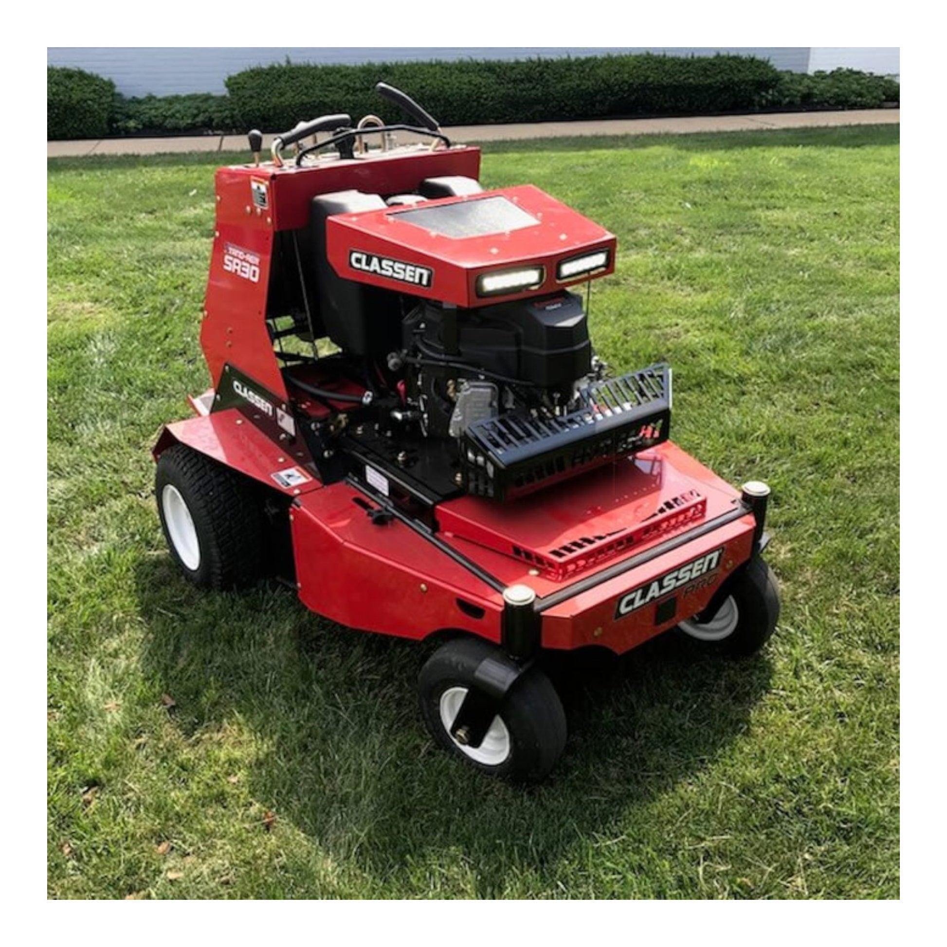 Classen SA-30A 30-inch Kawasaki FS541V PRO stand-aer aerator with heavy-duty tines, stand-on platform, and commercial-grade durability