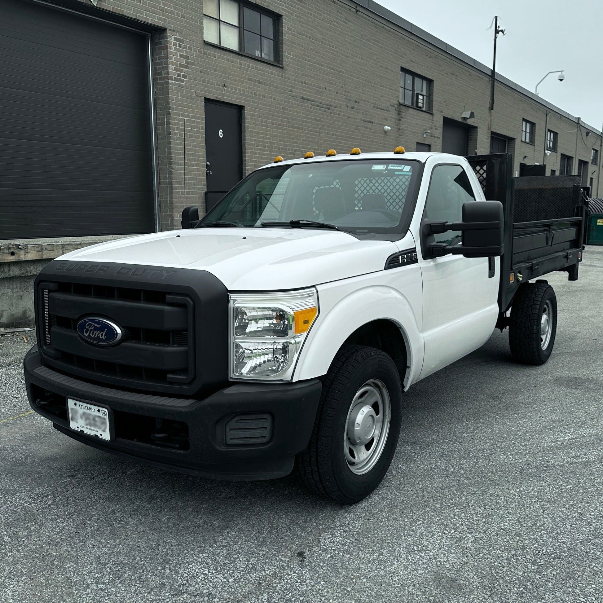 2012 Ford F-350 Flatbed Truck with Drop-Down Side Rails and Hydraulic Liftgate A