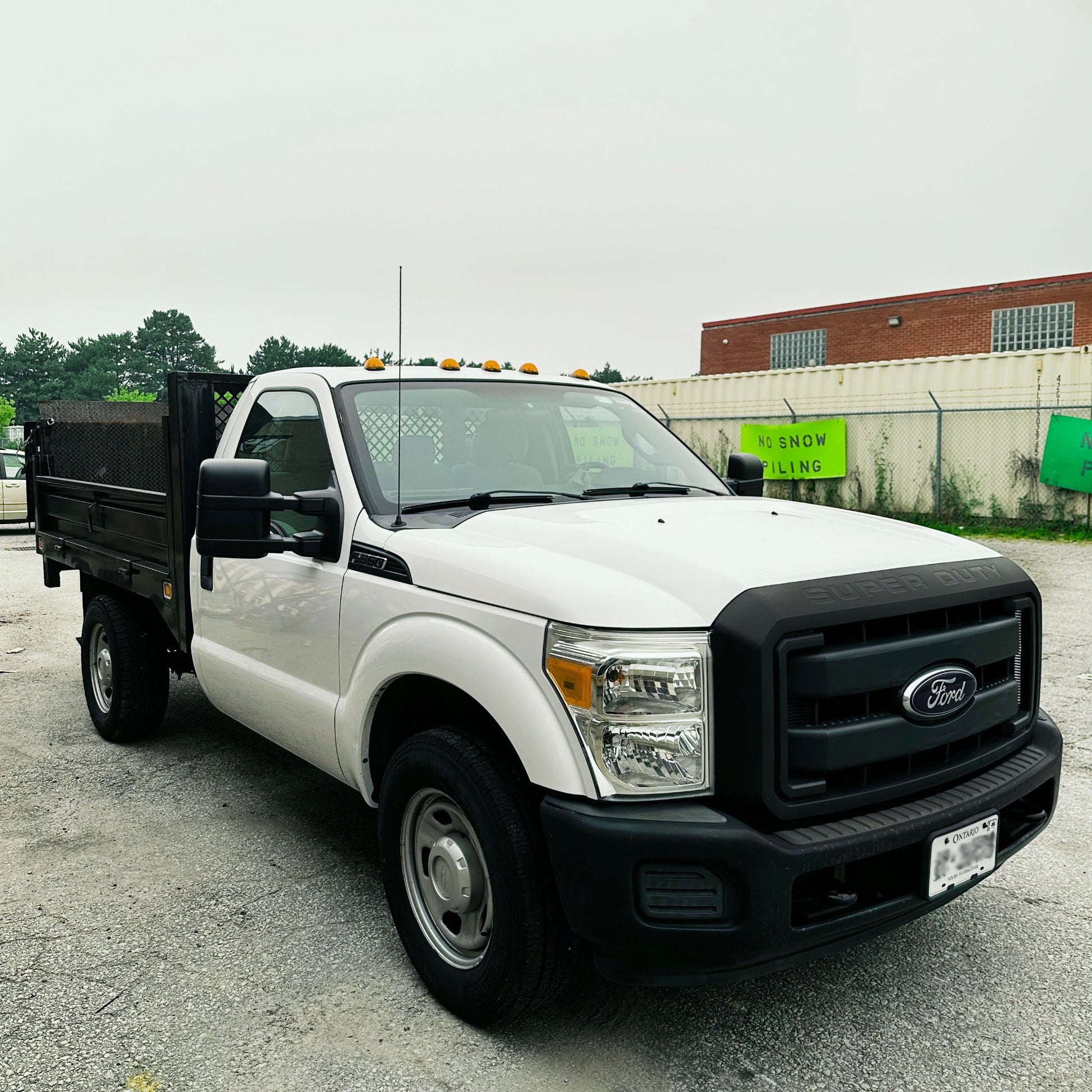 2012 Ford F-350 Flatbed Truck with Drop-Down Side Rails and Hydraulic Liftgate C