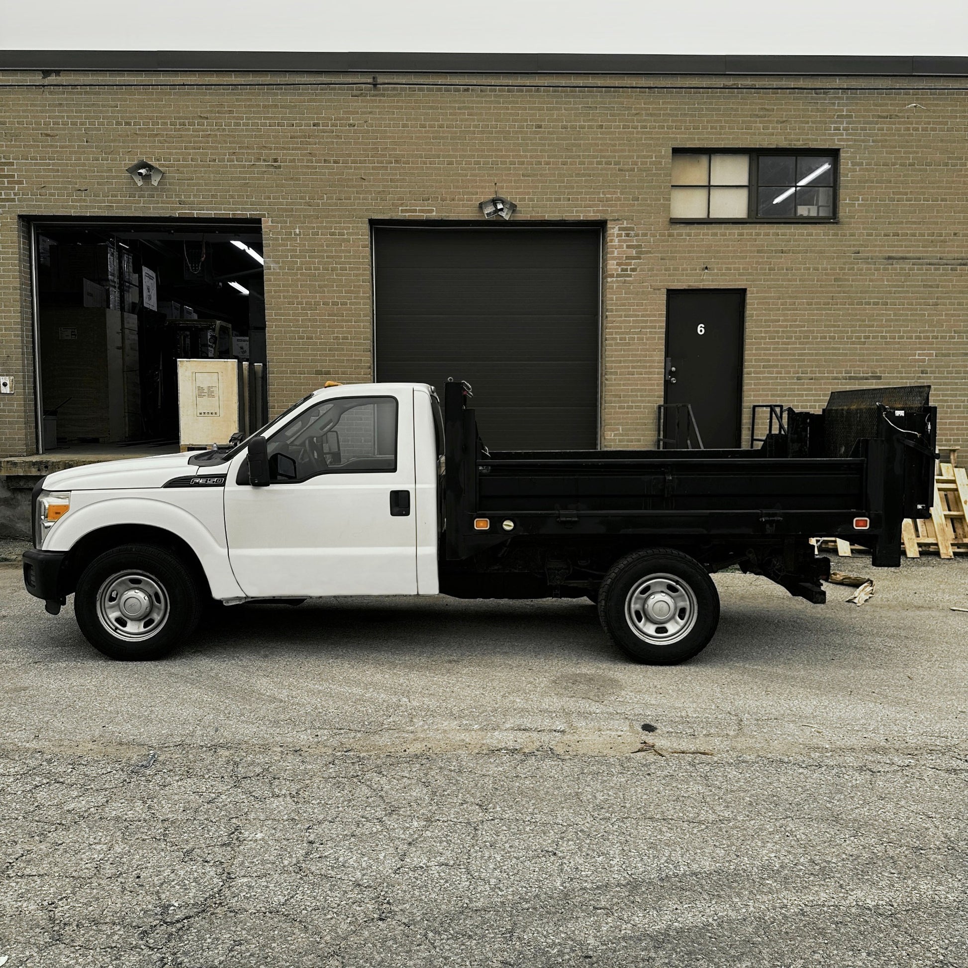 2012 Ford F-350 Flatbed Truck with Drop-Down Side Rails and Hydraulic Liftgate D