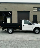 2012 Ford F-350 Flatbed Truck with Drop-Down Side Rails and Hydraulic Liftgate F