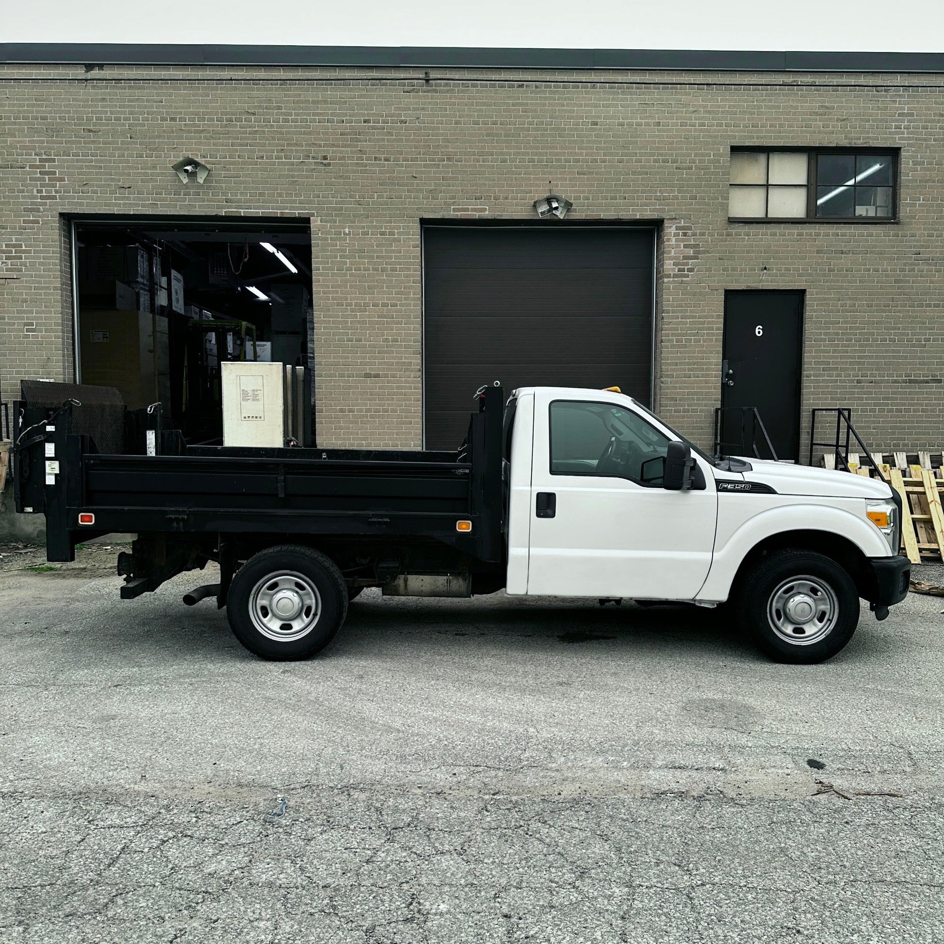 2012 Ford F-350 Flatbed Truck with Drop-Down Side Rails and Hydraulic Liftgate F