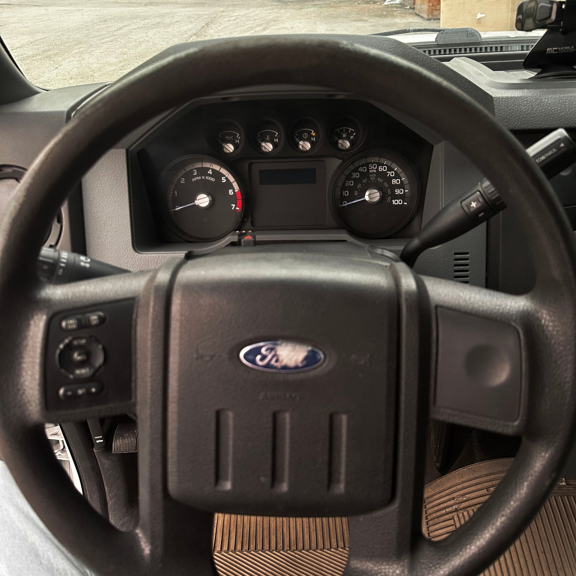 2012 Ford F-350 Flatbed Truck with Drop-Down Side Rails and Hydraulic Liftgate Q